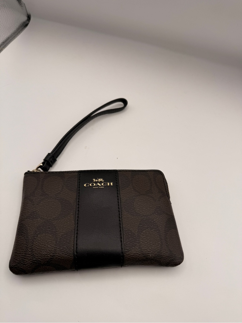 Coach Brown Monogram Wristlet with Black Center Stripe
